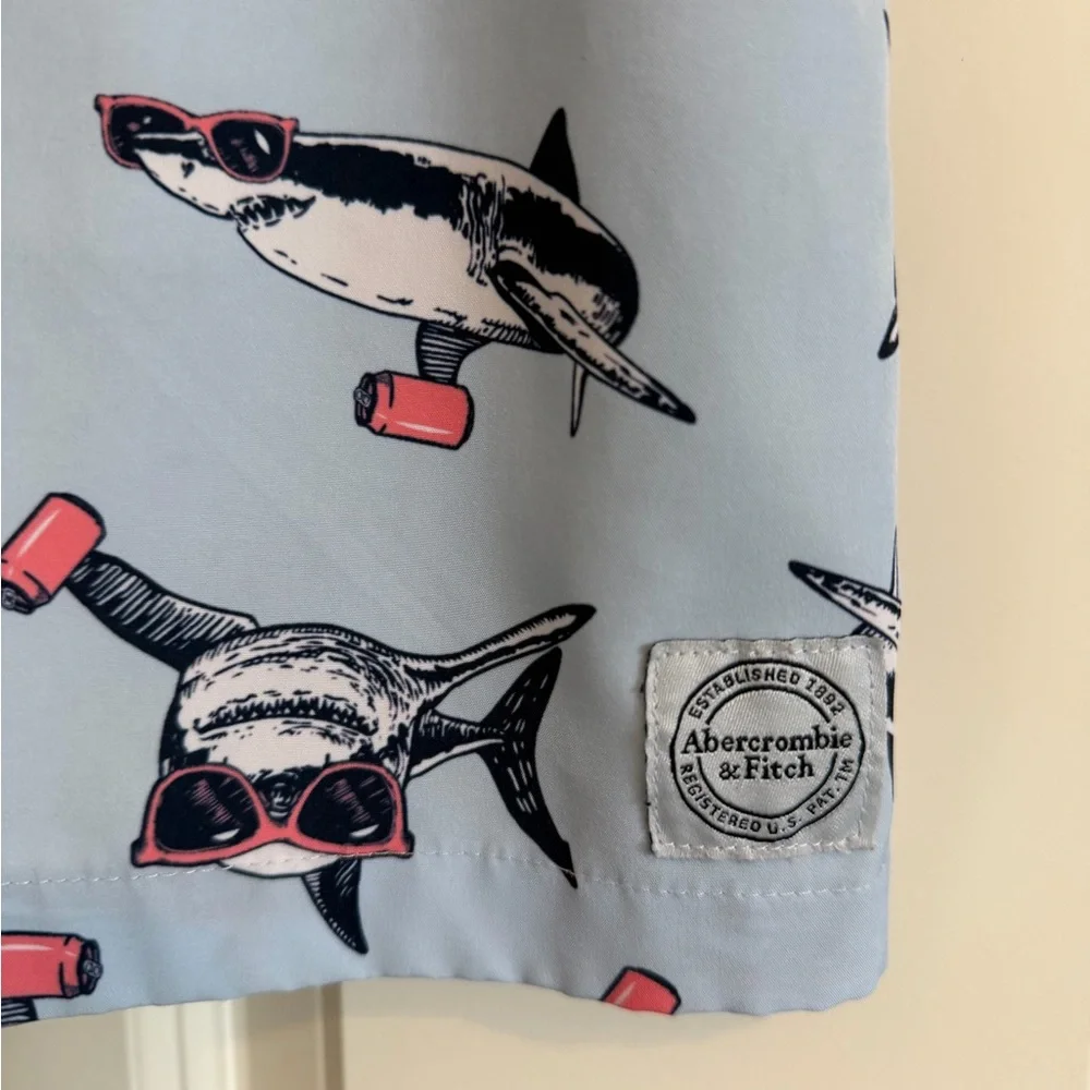 Abercombie kids shark print swim trunks.
